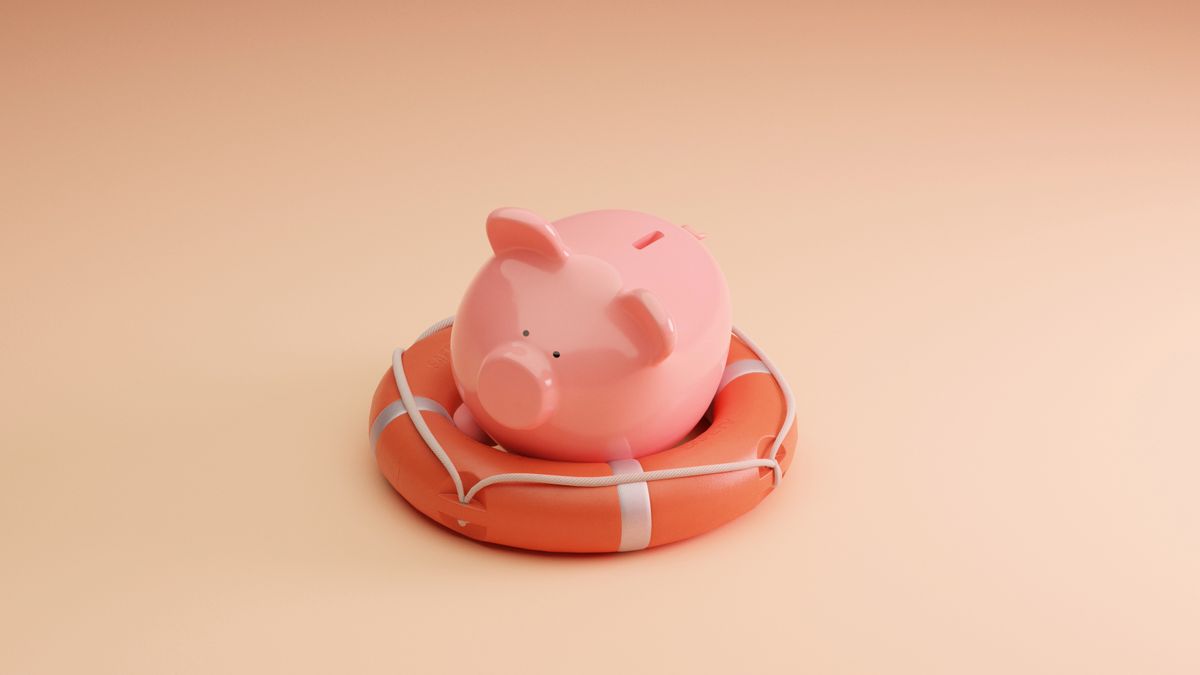 A piggy bank in a life ring, representing an emergency cash reserve